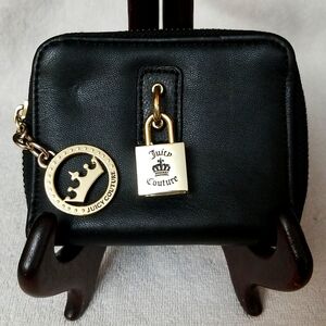 Juicy Couture wallet with look-alike lock and fancy zipper pull.